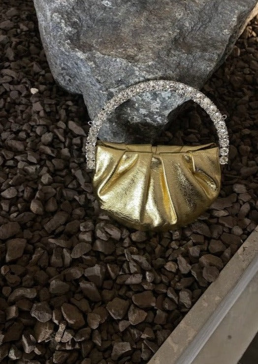 Round gold bag